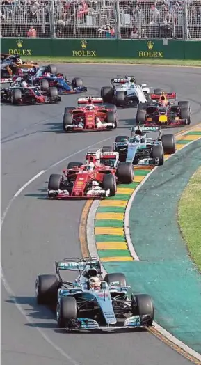  ?? REUTERS PIC ?? Mercedes’ Lewis Hamilton leads the race at the start of the Australian Grand Prix yesterday.