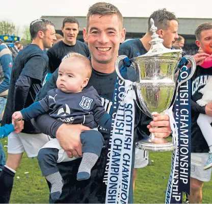  ??  ?? Left: Peter Macdonald celebrates after putting Dundee 2-0 ahead against Dumbarton at Dens Park. Above: The striker holds his son and the Championsh­ip trophy after the dramatic final day in 2014.