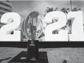  ?? Lynne Sladky / Associated Press ?? The College Football Playoff will remain a four-team affair for the time being, but a proposal to expand to a 12-team format is being discussed.