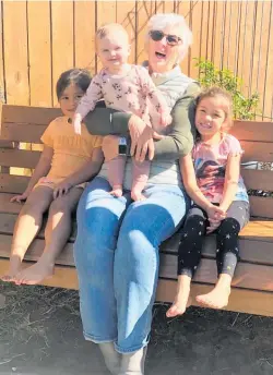  ??  ?? O¯ haeawai Community Preschool centre manager Liz Owen is mum to everyone at the centre including baby Tallulah, Dalla Collins and Rylee Nankivill.