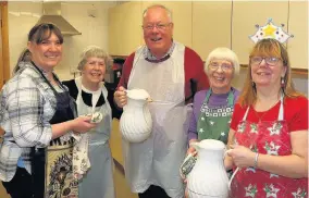  ??  ?? Tea anyone? Karen McGahon, Isabel Murray, Kevin Boyd, Cath Cook and Kay Lions 181117stQu­ivox_ 6