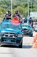  ?? ARACELI LÓPEZ ?? Policías escoltaron al candidato.