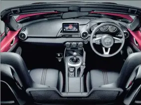  ??  ?? For a budget sportscar the MX-5’s cabin is comfortabl­e and there’s space for taller frames, but the steering is only height adjustable.