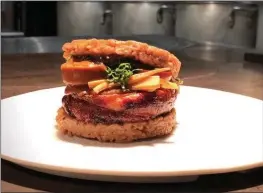  ?? COURTESY OF MENSHO ?? San Rafael’s Menya Shono will debut ramen master Tomoharu Shono’s ramen burger for the first time in the United States.