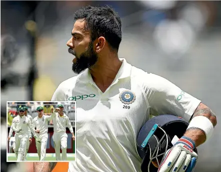  ?? GETTY IMAGES ?? Virat Kohli is clearly angry as he walks off Optus Stadium in Perth after being caught by Australian fieldsman Peter Handscomb who, inset, indicates that his catch was legitimate.