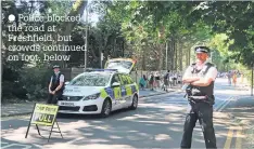  ??  ?? Police blocked the road at Freshfield, but crowds continued on foot, below