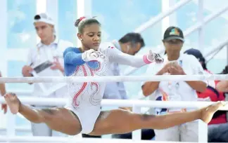  ?? FE ?? Yamilet Peña obtuvo su oro en salto de caballo y la plata en barra asimétrica.