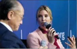  ?? AP PHOTO — JOSE LUIS MAGANA ?? White House senior adviser Ivanka Trump accompanie­d by World Bank President Jim Yong Kim speaks at the forum Taking Women-Owned Business to the Next Level, on the sidelines of the World Bank/IMF annual meetings in Washington, Saturday.