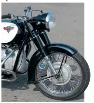  ??  ?? Convention­al tele forks hold up the front end – no Earles device here. Front brake is a handsome twin leader, and is certainly effective. Materials quality is first class, too