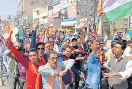  ?? AISHWARYA KANDPAL/ HT PHOTO ?? Members of Hindu Yuva Vahini during a victory march in Saharanpur, western UP to celebrate Yogi Adityanath’s appointmen­t as CM.