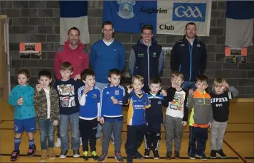  ??  ?? The Aughrim under-5s with special guests at the club’s awards event in the community grounds.