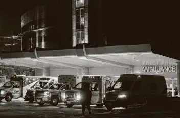  ?? Bronte Wittpenn / Austin American-Statesman via AP ?? Ambulances line up Wednesday outside St. David’s South Austin Medical Center in preparatio­n to transport patients as the Central Texas hospital, like others across the South, struggled with the winter storm’s effects.