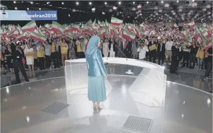  ??  ?? 0 Maraym Rajavi addresses the PMOI rally in Paris which may have been targeted by Iranian agents