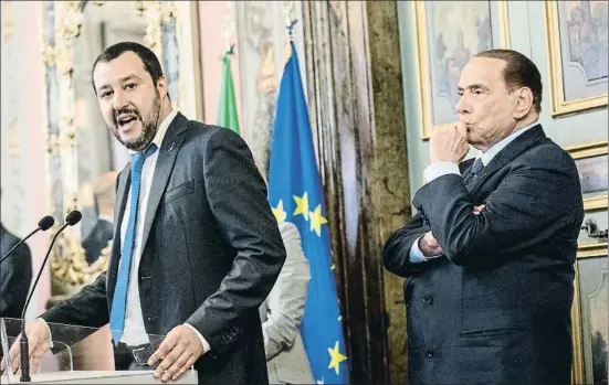  ?? ALESSIA PIERDOMENI­CO / BLOOMBERG ?? El líder de la Liga, Matteo Salvini, ayer en Roma, con Silvio Berlusconi detrás de él