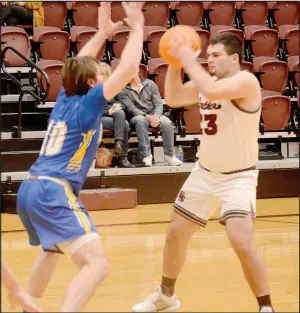  ?? Graham Thomas/Herald-Leader ?? Siloam Springs senior Thad Wright looks to make a pass against Mountain Home on Dec. 20. Wright and the Panthers play Claremore, Okla., at 8:30 p.m. Friday in the Siloam Springs Holiday Classic.