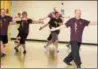  ?? DIGITAL FIRST MEDIA FILE PHOTO ?? Charles Brynan, of Pear Garden Tai Chi & Reflexolog­y, on the far right leads a tai chi class at the Pottstown YMCA.