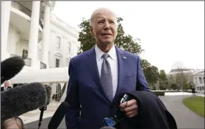  ?? (AP/Yuri Gripas) ?? President Joe Biden speaks to the media before boarding Marine One on the South Lawn of the White House in Washington on Thursday.