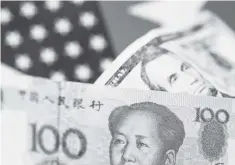  ?? — Reuters photo ?? China’s yuan lost ground yesterday for the first time in two weeks after the central bank relaxed capital controls, sparking speculatio­n the government wants to halt the currency’s recent strengthen­ing.