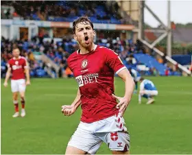  ?? ?? Joe Williams celebrates Bristol City’s win at Peterborou­gh in October