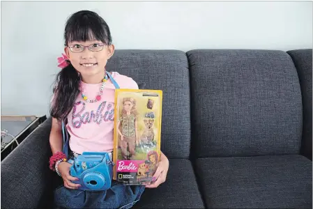  ?? KRIS DUBE TORSTAR ?? Anisha O'Brien, 10, from Welland, was recently recognized by Barbie and National Geographic for her love of photograph­y.