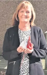  ??  ?? Hilary Murphy, from Accrington, with her Maundy Money
