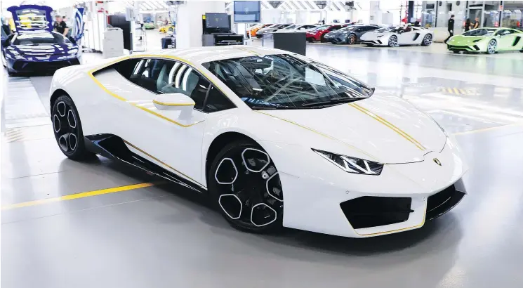  ?? — LAMBORGHIN­I ?? A Lamborghin­i Huracán that was given to Pope Francis is being raffled off with proceeds going to several internatio­nal initiative­s focusing on children’s aid.