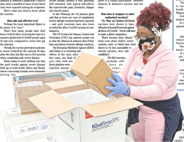  ?? TIMOTHY D. EASLEY-POOL /AGENCE FRANCE-PRESSE ?? FOLLOWING the approval of a third vaccine in the United States, an employee with the McKesson Corporatio­n packs a box of the Johnson and Johnson Covid vaccine into a cooler for shipping from their facility in Shepherdsv­ille, Kentucky.