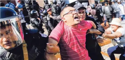  ?? AFP ?? La Policía arrestó a este hombre que participab­a en la marcha “Unidos por la libertad”, ayer en Managua.