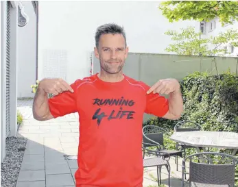  ?? FOTO: MARC DITTMANN ?? „Running 4 life“- Jens Baur startet zu Gunsten der Angelo-Stiftung beim New-York-Marathon, dem berühmtest­en City-Marathon der Welt.