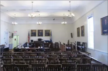  ?? AP PHOTO — DAVE COLLINS ?? The second-floor courtroom of the Litchfield Judicial District Courthouse is shown in Litchfield, Conn. The state of Connecticu­t closed the courthouse and relocated operations to a new, $80 million courthouse in nearby Torrington. Because the state is...