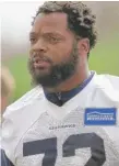  ?? | AP ?? The Seahawks’ Michael Bennett sat during the national anthem Sunday against the Chargers.
