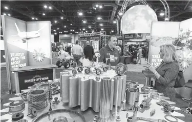  ?? Steve Gonzales / Staff photograph­er ?? Forest City Gear displays its products on the show floor at SpaceCom on Tuesday.