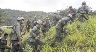  ?? EFE ?? Milicias. Cerca de 900,000 “combatient­es” de la milicia y el pueblo, de los cuales 200.000 son militares, participar­án en un ejercicio cívico militar de este fin de semana en Venezuela, ante las amenazas de EEUU.