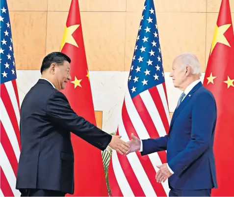  ?? ?? Xi Jinping, the Chinese president, and Joe Biden, the US president, at the G20 summit in Bali. It is the pair’s first in-person meeting since becoming world leaders