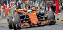  ??  ?? Struggling: Fernando Alonso was a massive two seconds off the pace in opening practice at Melbourne this morning