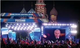  ?? Photograph: Alexander Nemenov/AFP/Getty ?? Vladimir Putin addresses crowds at a concert to celebrate the claimed annexation of Luhansk, Donetsk, Kherson and Zaporizhzh­ia.