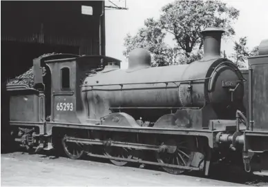  ?? Chris Bush Collection, courtesy The Engine Shed Society ?? Built at Cowlairs as NBR ‘717’ class No 722 and new to traffic in June 1897, ‘J36’ No 65293 was continuous­ly based at Canal shed after first arriving in April 1930. Fitted with a cab shelter for tender-first operation, occasional­ly over branch lines and perhaps even for working from London Road on banking turns towards Newcastle, the engine seems to have been somewhat exuberantl­y coaled when seen in 1959, as it is sitting part in and part out of the lifting shop at the rear of Carlisle Canal roundhouse. The locomotive’s career ended in a manner different to the usual. After it was withdrawn on 5 November 1962 it was transferre­d to stationary boiler stock at Gourock, where it was observed in use in July 1963. However, it was noted as stored out of use at Greenock (Ladyburn) shed a year later, and afterwards was cut up by Motherwell Machinery & Scrap, Wishaw.