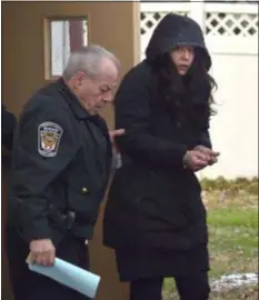  ?? PETE BANNAN - DIGITAL FIRST MEDIA ?? Lauren Semanyk is led out of District Court in Secane after her arraignmen­t for the overdose death of her daughter, 10-month-old Angelina on April 16, after the child ingested the drug in her home. Also charged was her partner Joseph Milano.