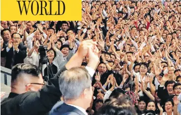  ?? PYONGYANG PRESS CORPS / POOL / GETTY IMAGES ?? North Korean leader Kim Jong Un, left, and South Korean President Moon Jae-in, right, acknowledg­e a crowd in Pyongyang, Wednesday. Kim and Moon are holding talks on the denucleari­zation of the Korean Peninsula.