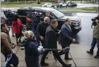  ?? KIRSTEN LUCE THE NEW YORK TIMES ?? Alex Jones exits the courthouse for a lunch recess after briefly speaking to the media in Waterbury, Conn. on Sept. 22, 2022. While claiming he is broke, Alex Jones has spent heavily on luxuries, including a private jet, bodyguards and a villa with a pool and tennis court.