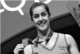  ??  ?? Carolina Marín als frischgeba­ckene Badminton-Europameis­terin.