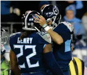  ?? AP PHOTO BY MARK ZALESKI ?? Tennessee Titans running back Derrick Henry (22) celebrates his touchdown with Tennessee Titans quarterbac­k Marcus Mariota (8) Thursday, Dec. 6, in Nashville, Tenn.