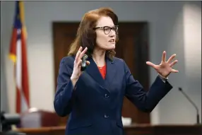  ?? (AP/Octavio Jones) ?? Prosecutor Linda Dunikoski speaks Friday during opening statements in the trial of Greg McMichael;
his son, Travis McMichael; and a neighbor, William “Roddie” Bryan at the Glynn County Courthouse in Brunswick, Ga. Video at arkansason­line.com/116arbery/.