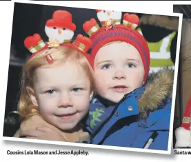  ??  ?? Cousins Lola Mason and Jesse Appleby. Santa waves to the crowds.