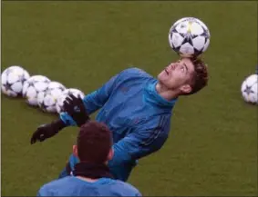  ?? THE ASSOCIATED PRESS ?? Real Madrid’s Cristiano Ronaldo controls the ball during a training session in Madrid, Tuesday. Real Madrid will play Juventus Wednesday in a Champions League quarter-final, 2nd leg soccer match.