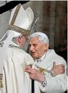  ?? AP ?? Emeritus Pope Benedict XVI, right, hugs Pope Francis inside St Peter’s Basilica in December 2015. Emeritus Pope Benedict XVI turned 95 on April 16, a significan­t milestone on its own but even more so given he has now been a retired pope longer than he was a reigning one. A new book sets out to examine the current state of Vatican affairs.
