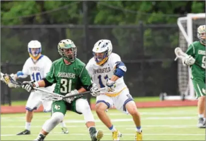  ?? ANNE NEBORAK — DIGITAL FIRST MEDIA ?? Springfiel­d’s stifling defense — featuring Kyle Long (11), Zac Venit (10) and a host of others — made for a long day for Nick Heiler (31) and Lansdale Catholic, as the Cougars recorded the first shutout in PIAA tournament history with a 12-0 win in...