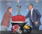  ?? KIRBY LEE/USA TODAY SPORTS ?? Alabama’s Nick Saban, left, and Michigan’s Jim Harbaugh shake hands a day before their Rose Bowl playoff semifinal.