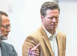  ?? PHOTOS BY TOM TINGLE/THE REPUBLIC ?? Paul Petersen, right, appears in Maricopa County Superior Court with his attorney, Kurt Altman, on Thursday.