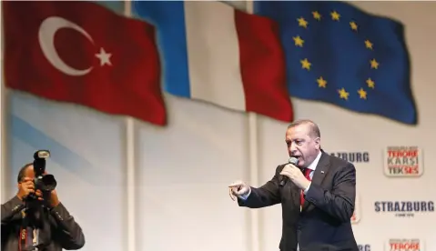  ??  ?? TURKISH PRESIDENT Recep Tayyip Erdogan speaks to a crowd in Strasbourg last October. (Reuters)